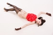 Photo: Lifeless brunette lying on the floor Lifeless brunette lying on the floor