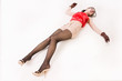 Photo: Lifeless brunette lying on the floor Lifeless brunette lying on the floor