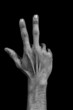 Hand on black back - three