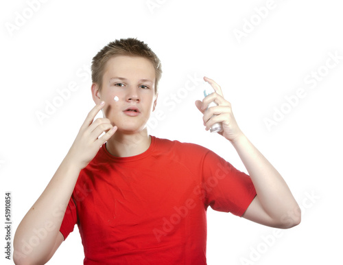 Photo: teenager with a cream forproblem youthful skin,against spots... teenager with a cream forproblem youthful skin,against spots...