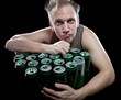 Photo: The drunk man and is a lot of empty beer cans The drunk man and is a lot of empty beer cans