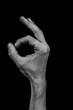Hand on black back - zero