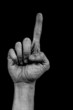 Hand on black palm - one