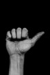 Hand on black palm - one