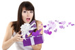 Foto: girl opens a box surprise of hearts girl opens a box surprise of hearts