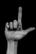 Hand on black palm - two