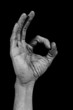 Hand on black back - zero