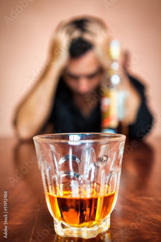 Photo: Drunk and depressed man addicted to alcohol Drunk and depressed man addicted to alcohol