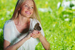 Foto: Woman playing with a butterfly Woman playing with a butterfly