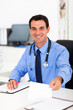 doctor handing patient prescription