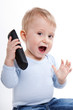 One year old boy with phone