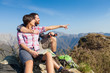 Young Couple at Top of Mountain