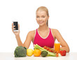 woman with fruits, vegetables and tablet pc