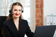 Foto: Young Woman from the customer service Young Woman from the customer service