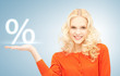 Photo: girl showing sign of percent in her hand girl showing sign of percent in her hand