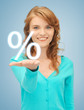 Foto: girl showing sign of percent in her hand girl showing sign of percent in her hand
