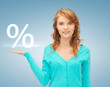 Foto: girl showing sign of percent in her hand girl showing sign of percent in her hand