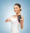 woman showing smartphone with app
