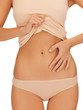 woman placing hand on her belly