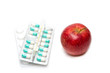 composition with medicaments and apple. selective focus
