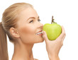 woman smelling apple