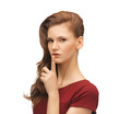 woman with finger on her lips