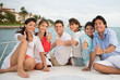 Happy friends with thumbs up