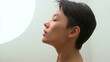 Video: Beautiful Mixed Race woman looking into light Beautiful Mixed Race woman looking into light