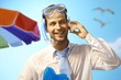 Happy businessman on the beach