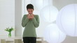 Cute Asian woman drinking tea
