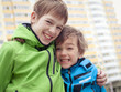 Two brothers laugh, outdoor