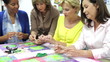 Video: Group Of Women Working On Quilt Together Group Of Women Working On Quilt Together
