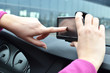 Photo: Driver entering an address into the navigation system Driver entering an address into the navigation system