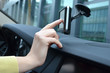 Driver entering an address into the navigation system