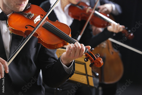Photo: Classical music. Violinists in concert Classical music. Violinists in concert