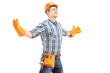 Happy manual worker with helmet spreading arms