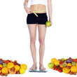 Photo: Gemüse und Obst hält schlank und fit, Frau auf Waage Gemüse und Obst hält schlank und fit, Frau auf Waage