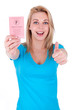 Photo: Happy caucasian teenage girl showing her driving license and mak Happy caucasian teenage girl showing her driving license and mak