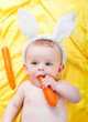 boy with a carrot in his hand