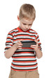 Photo: Pensive boy with a smartphone Pensive boy with a smartphone