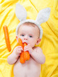 boy with a carrot in his hand