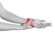 Acute pain in a woman wrist. Female holding hand to spot of wris
