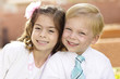 Photo: Portrait of two cute kids formal dress Portrait of two cute kids formal dress