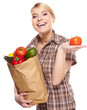 Young woman with a grocery shopping bag. Isolated on white backg