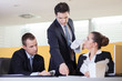Annoying supervisor giving his coworkers a hard time during lunc