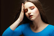 Distress. Woe. Upset Woman Touching her Forehead. Difficulties