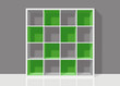 white empty square bookshelf with green elements on grey wall ba