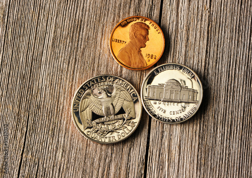 Photo: US cent coins over wooden background US cent coins over wooden background