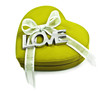 a Green heart with the word love spelled out in silver on  white