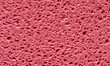 pink sponge with porous texture background